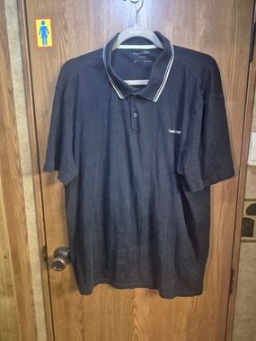 Calvin Klein Men’s Black Polo with White Contrast Trim.  Box 45L